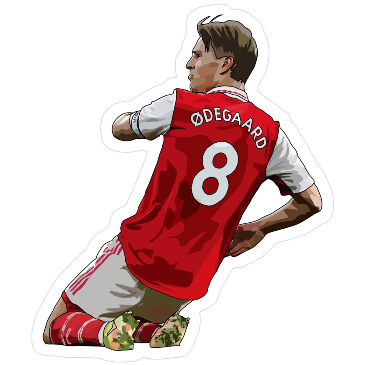 Die-cut sticker of Martin Odegaard sliding in celebration wearing an Arsenal number 8 jersey.