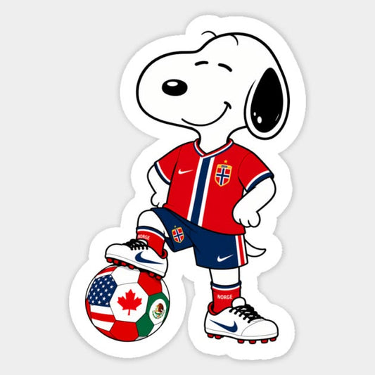 Die-cut sticker of Snoopy in a Norway football kit standing on a soccer ball printed with USA, Canada, and Mexico flags.